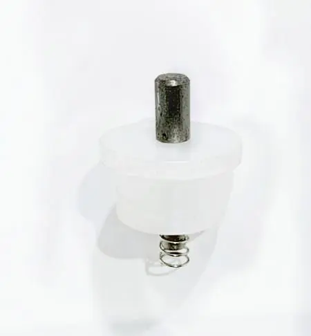 Tapones con resortes, seguros y ejes